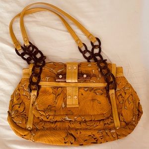R&Y Augousti yellow laser-cut suede handbag